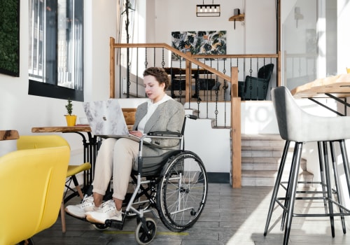 Who assists ndis participants to develop their ndis plan?